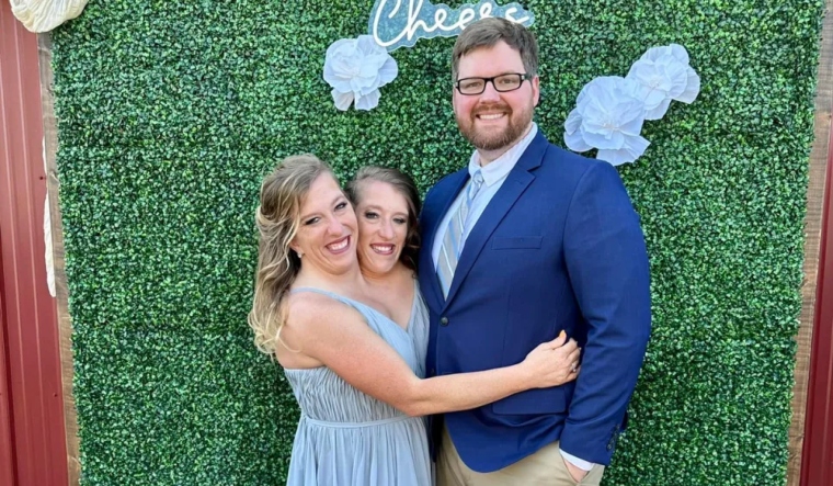 Josh Bowling's wedding image with conjoined twins Abby and Brittany Hensel